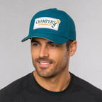 Model wearing Champers teal green performance pickleball hat with rubber logo patch