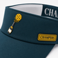 Champers green pickleball visor with rubber logo patch, open-top