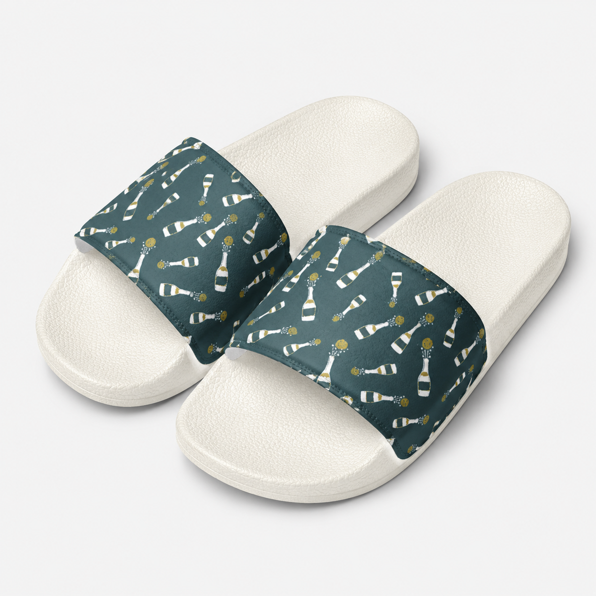 Cushioned faux leather strap; contoured footbed; PU outsole; handmade