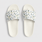 Cushioned faux leather strap; contoured footbed; PU outsole; handmade